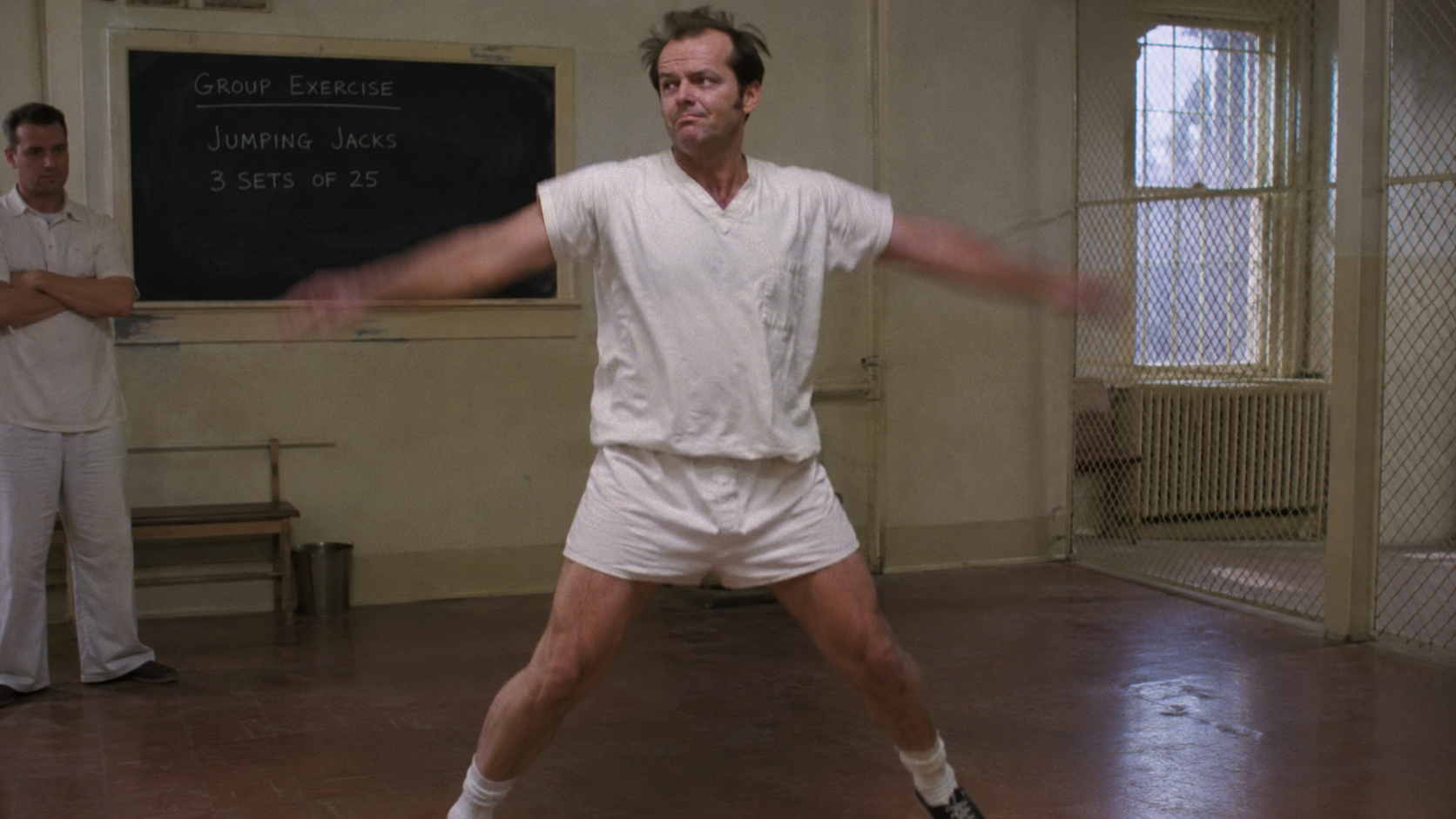 Prompt: Jack Nicholson reluctantly doing jumping jacks