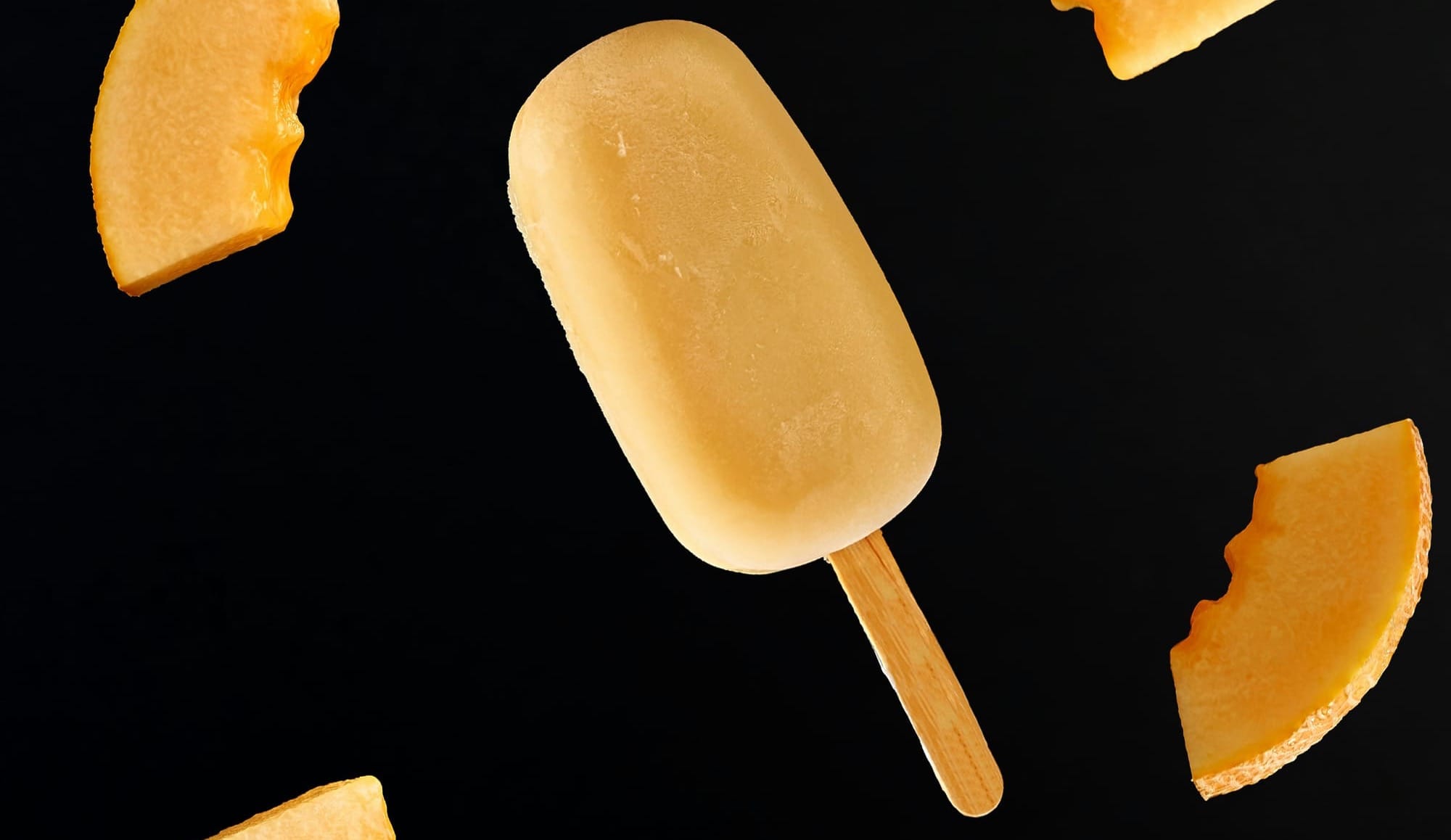 This is a stock photo of a melon popsicle, not one made from the recipe below. 