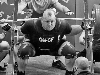 Team Juggernaut's Blaine Sumner has the highest squat of all time without knee wraps at 881 pounds!!