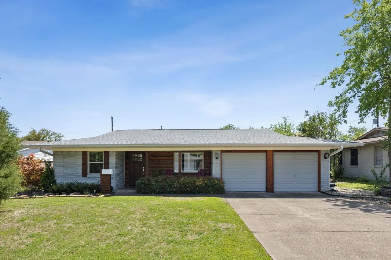 Traditional single-family house exterior showing the home we sold before moving to tiny house living