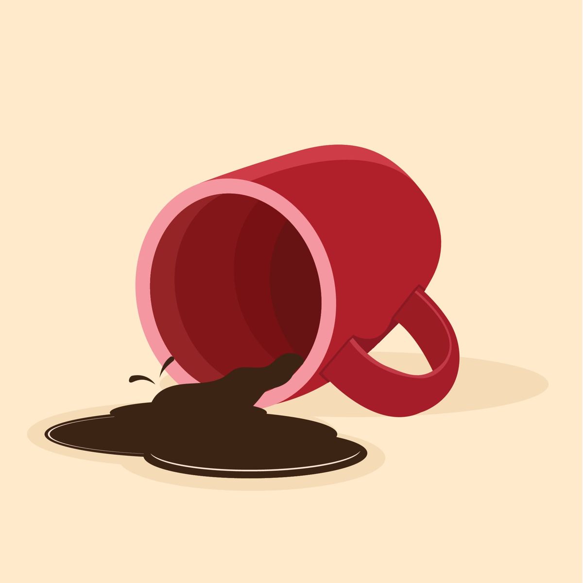 A spilled cup of coffee, from a red mug.
