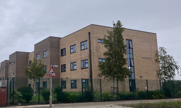 Photograph of the exterior of Brushwood Care Home in Speke on a cloudy day