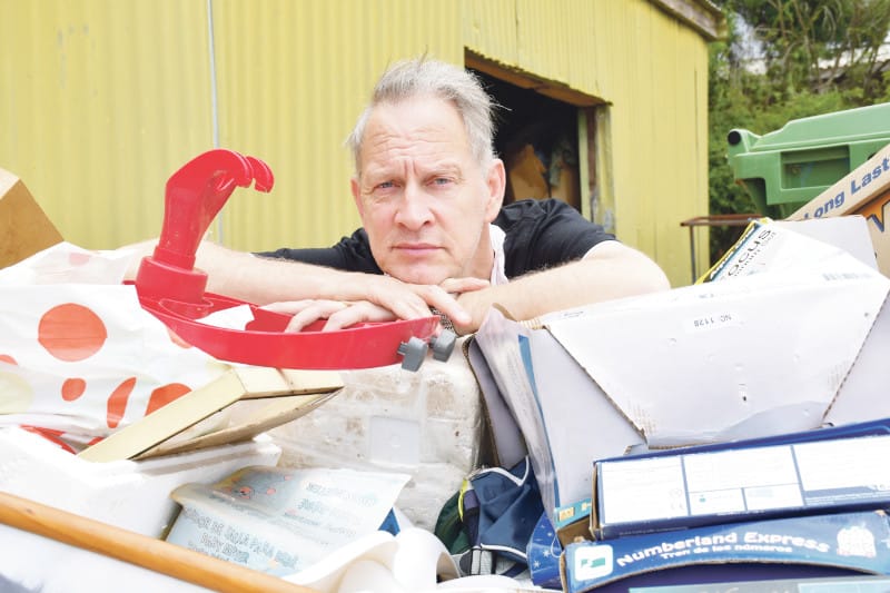 Up to neck in rubbish