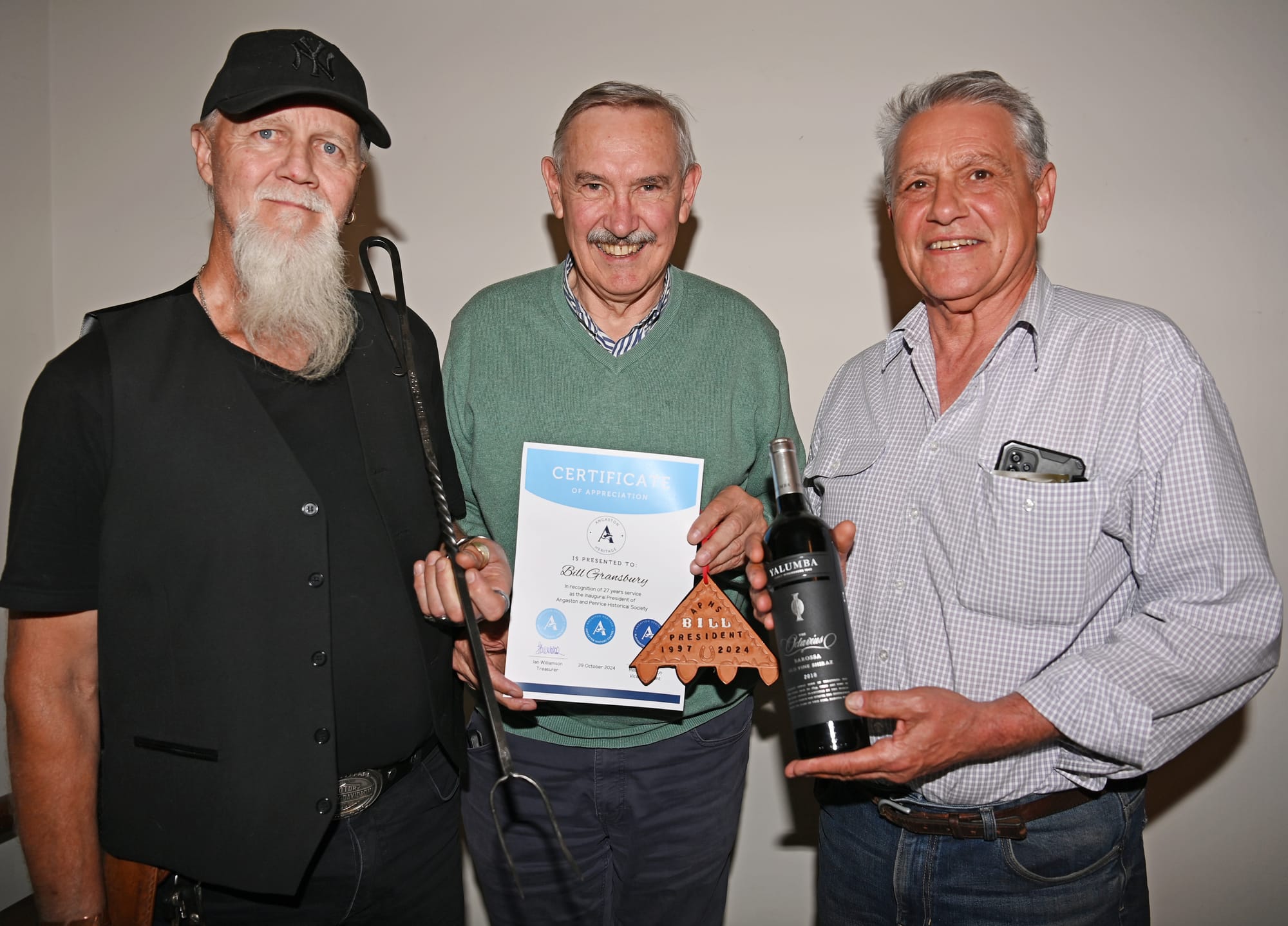 Bill honoured for 27 years' service