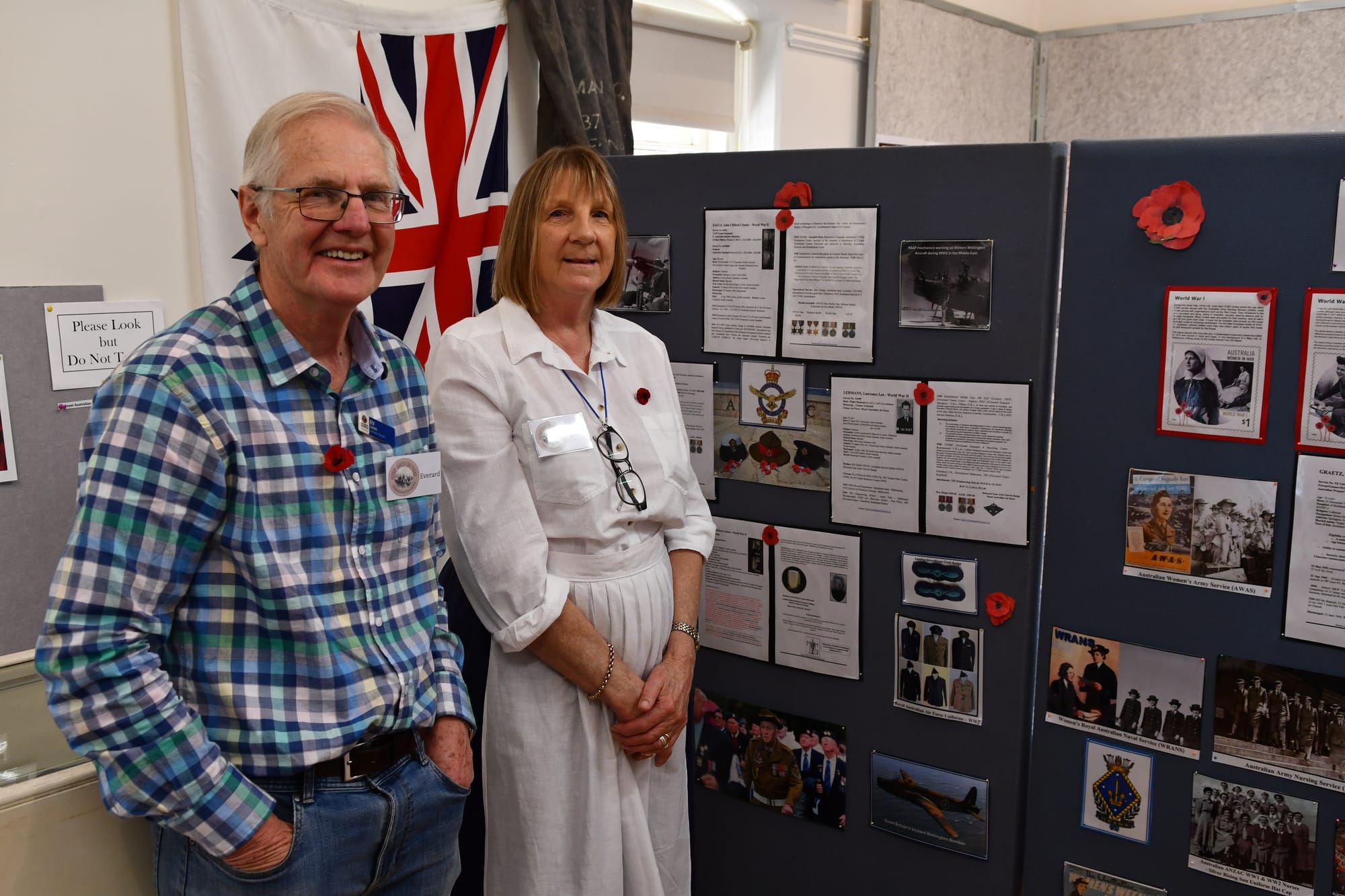 Everard Leske and Jan Burgess with some of the work they put together for the ANZAC exhibition.