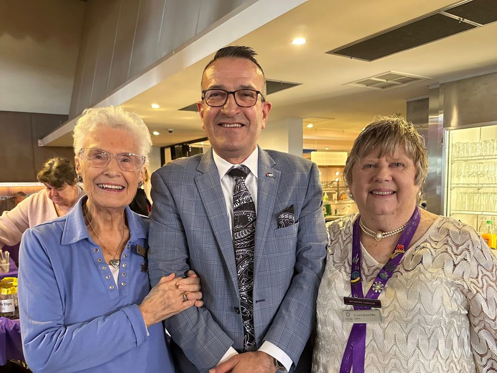 Women in arms with shared VIEW post image