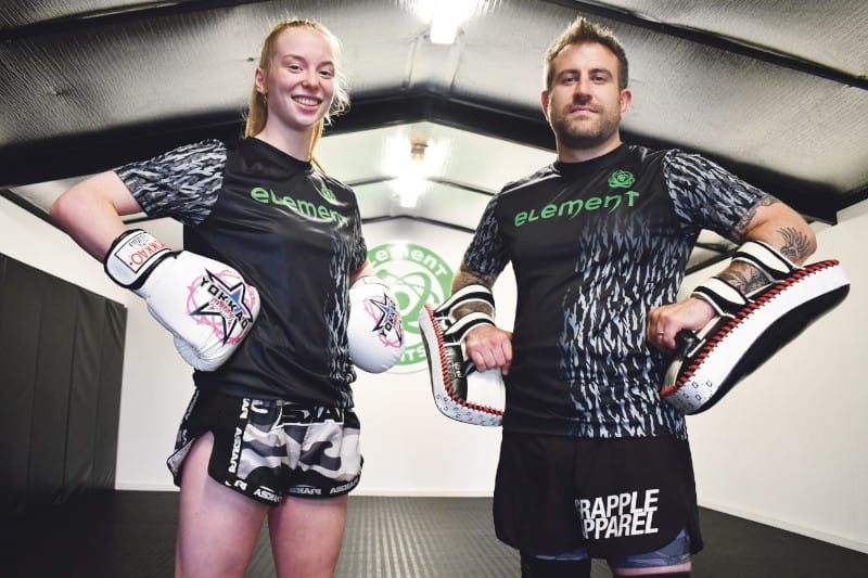 Focused young fighter makes martial arts history post image