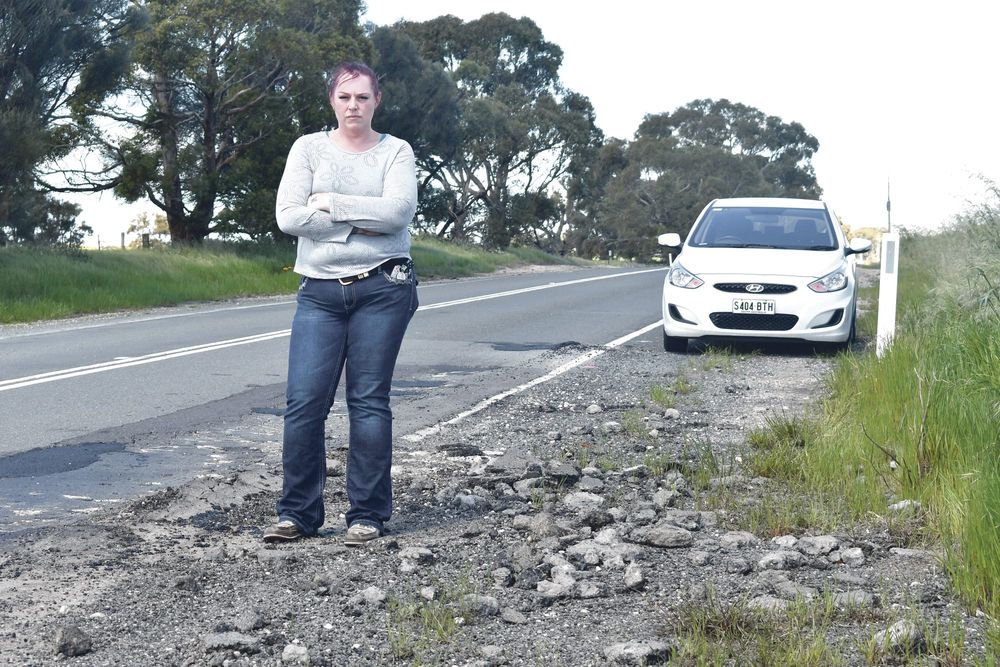 “Fix our roads” post image