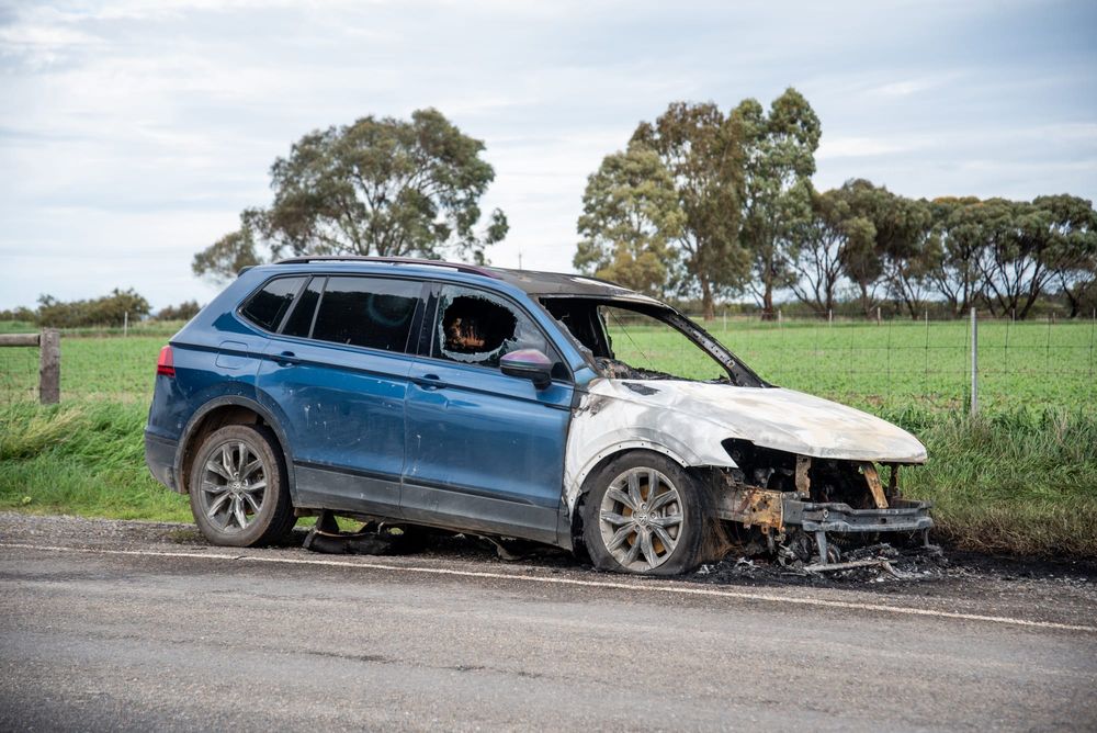 Dad safe after car engulfed in flames post image