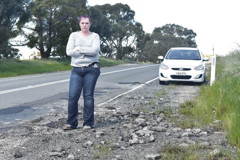 “Fix our roads” post image