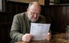 Indoor Cat Colleague Earnestly Peruses Wine List At Shit Pub