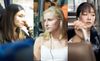 Young Women Longingly Staring Out Bus Window Clearly Listening To New Rodrigo Album