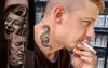 Bloke With Full Sleeve 'Theatre Masks' Tattoo Certainly Doesn't Mind A Bit Of Drama