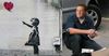 Banksy unveiled as former Howard foreign minister Alexander Downer