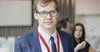 Office Manager With ID On New Official Lanyard Feeling Powerful Beyond Measure