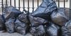 Bags Of Old TapOut And Ed Hardy Shirts Sitting Outside Salvos Not Helping Anyone