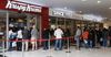 Tasmanians In Melbourne Airport Line Up For Carry-On Donuts Like War-Time Rations