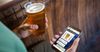 First Bloke At Pub Has Had Way More Solo Phone Beers Than He’s Letting On