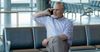 Salesman At Airport Gate Talking About Payroll Software Conference Like It’s Coachella