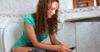 Woman With No Reception In Bathroom Mindlessly Attempts To Refresh Instagram Feed