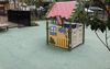 Government Treats Local Houso Kids To Unimaginative Floor-Level Playground On Fake Grass