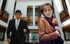 Michaelia Cash Clutches Her Handbag Closer As Uncle Tony Walks Past In Parliament