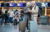 Confused Boomers Clutch To Printed-Out Itinerary Hoping It Will Reveal How To Check-In