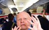 Confused Boomer Attempts To Move Against The Flow Of Passengers Disembarking Plane