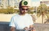 Man Without Stake In Society Wears Cannabis Leaf Hat In Public