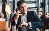 Drunk Corporate Pauses Phone Call To Aggressively Point Out Empty Wine Bottle To The Waiter