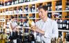 Man Reads Label On $4 Bottle Of Brain Varnish Like It’s Going To Influence Decision To Buy It