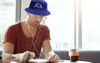 West End Arts Student Expected To Swing Democratic Primaries With His New Bernie Bucket Hat