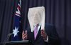 PM Fronts Media With Plastic Bag Over Head To Reassure Nation There’s Nothing To Worry About