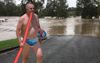 Scotty From Marketing Turns Up In Flood Affected Area With Pool Noodle And Wahu Footy