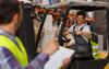 Essentially Essential Worker Arrives At The Essential Factory For Another Shift Of Essentially Essential Work