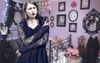 Emo Gladys Briefly Exits Bedroom To Sneak A Plate Of Potato Bake During Family Christmas
