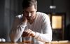 Man Drinking Whiskey Alone In Bar Unfortunately Unmysterious