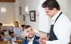 Local Bloke Tentatively Pronounces Word On Menu In Hopes Waiter Will Put Him Out of His Misery