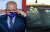 PM Tries To Get Women Back On-Side With Frangipani Stickers on Back Windscreen Of Holden Cruze