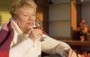 Recently Retired Mum Treats Herself To Nice Glass Of Savvy B After Day Pottering Around Garden