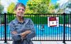 Vigilant Mum Staples QR Check-In on Backyard Pool Gate Before Silly Season Begins