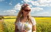 Vegan Earth Child Prances Through Beautiful Canola Crop That’s Had More RoundUp Sprayed On It Than The MCG
