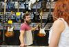 Charming Service From Handsome Metalhead Inspires Local Mum To Stay and Browse Guitars For a While