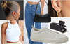 Early-20s It Girl Mixes It Up With White Tank Top, Slicked Hair, Baggy Jeans And Sneakers