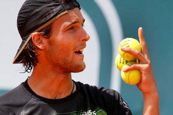 A visibly confused Joao Sousa responds to the equally confused "Fanatics"