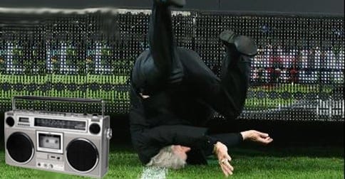 Frank "The Tank" Lowy performs old-school breakdancing moves. To a roaring reception.