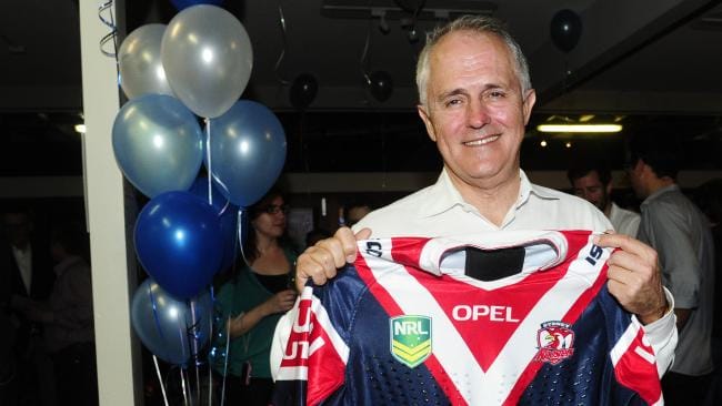Malcolm Turnbull shows his eastern suburbs colours after the Sydney Roosters won the minor premiership in 2013, the night he was re-elected to his seat of Wentworth