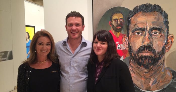 Julie Fison, Archibald 2014 finalist Alan Jones and Archibald 2014 winner Fiona Lowry with Jones' portrait of Adam Goodes - an Australian footballer who is more popular than the entire Australian art scene.