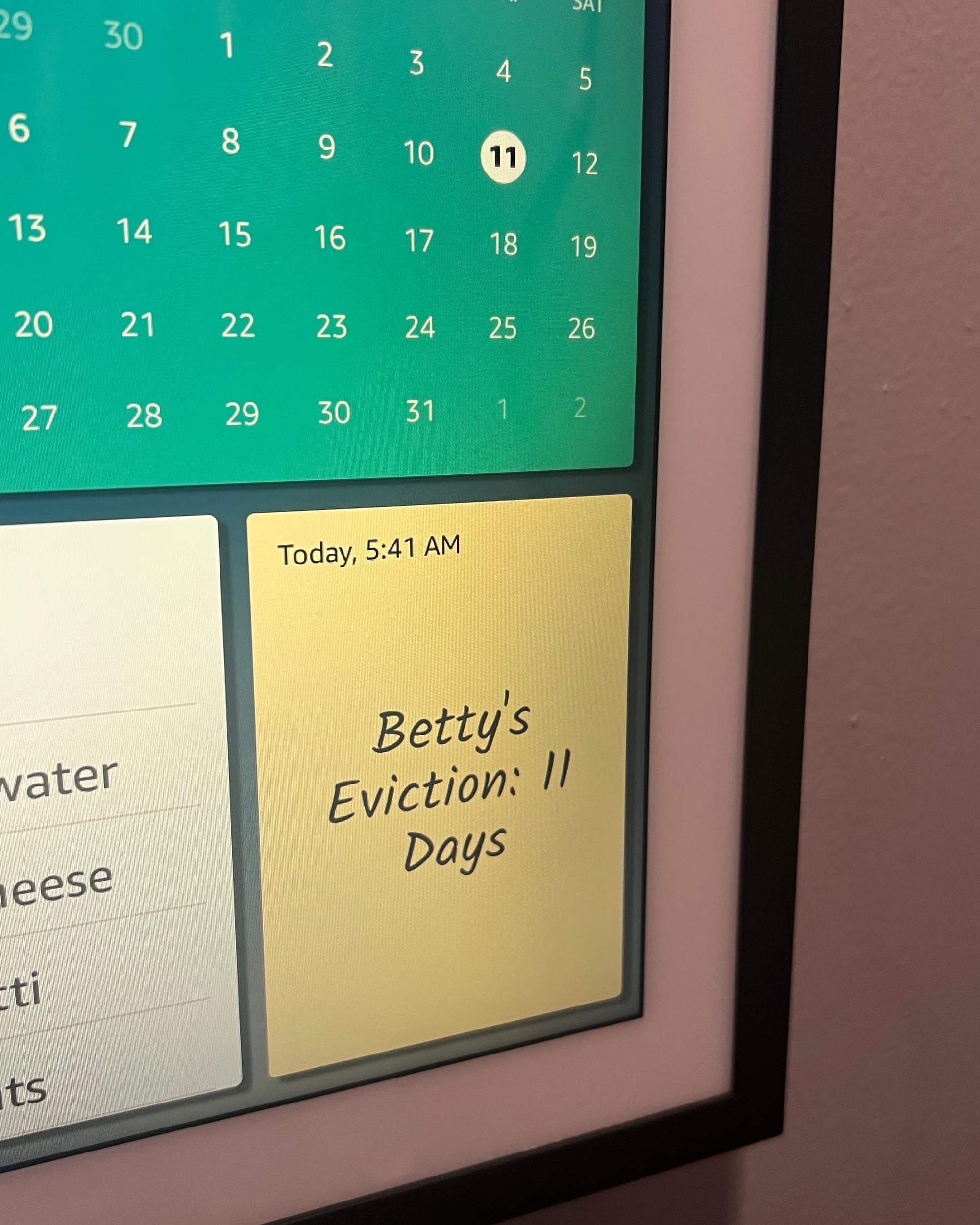 An Alexa device sticky note showing "Betty's Eviction: 11 Days"