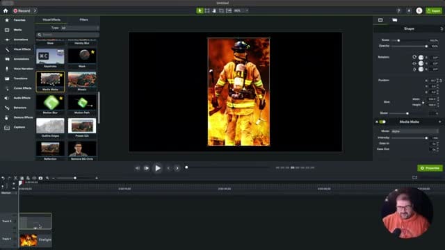 Camtasia canvas showing the firefighter image masked through a rectangle shape, revealing only the firefighter